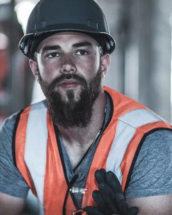 contractors going over a blueprint on public school project